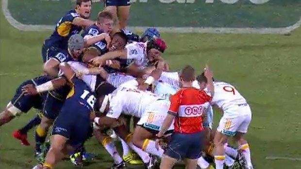 Brumbies player David Pocock grabs Chiefs player Michael Lietch around the neck. Pocock was suspended for two games by the SANZAAR judiciary.