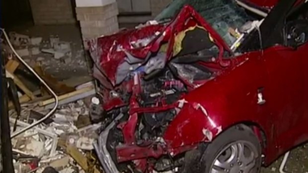 There were no injuries when a car was driven through a house in Brisbane.