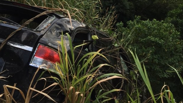 The woman was found in the car wreck down a steep embankment at Kuranda Range.