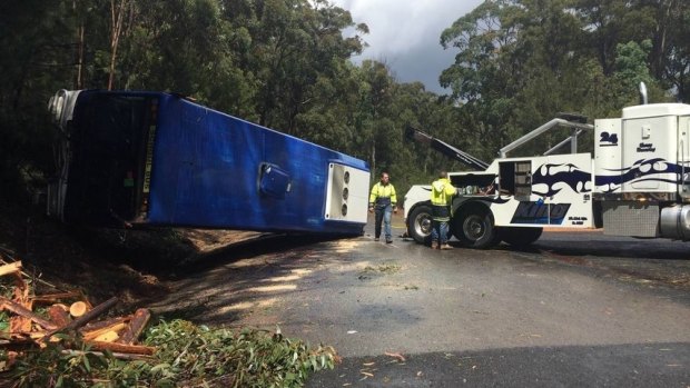 A bus with 20 students aboard has rolled over on the NSW south coast near Eden.