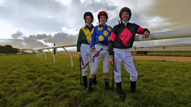 Jockey Jamie Bayliss returned to riding at Mornington after 20 years, against his sons Regan (green) and Jake (blue). 
