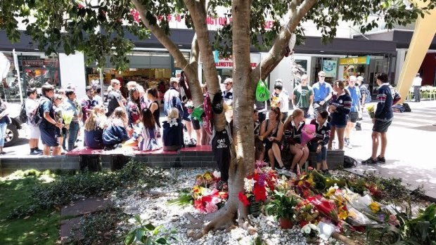 Barely a word was heard during the lunchtime memorial for Cole Miller in Brisbane's Chinatown Mall.