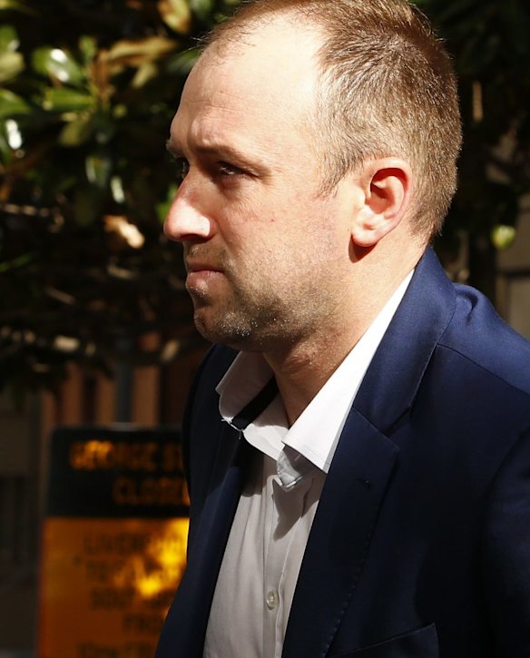 Phillip Hughes' brother Jason arrives at the inquest.