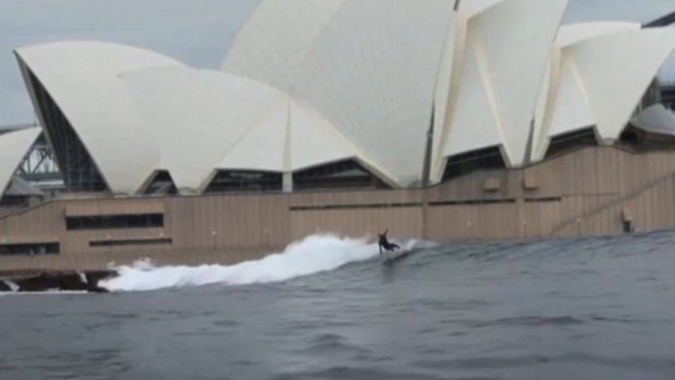 A surfer takes on the break in this edited footage from 2012, which re-surfaced during the Sydney storm.