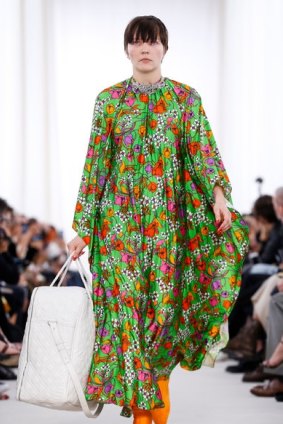 A model carries one of the 'blanket bags' in Demna Gvasalia’s Balenciaga debut.