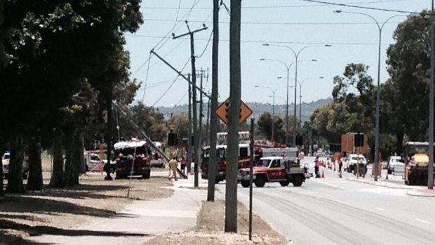 A fire truck has hit a power poll on Olga Road, Maddington, bringing down power lines.