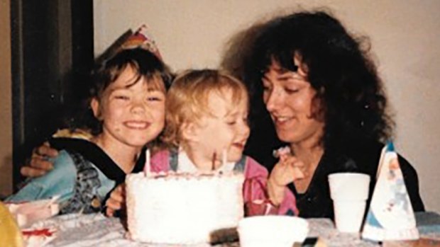 The author (centre) celebrates her second birthday.
