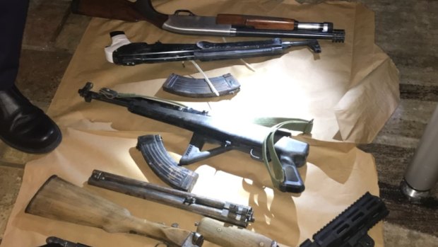 Police seized guns, ammunition and a hand grenade during raids targeting bikie gangs in Canberra.