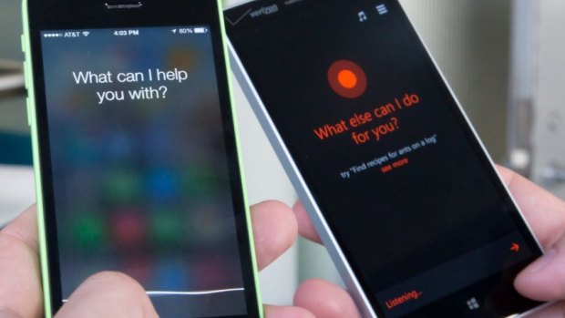 Head-to-head: Apple's Siri (left) and Microsoft's Cortana virtual assistants.