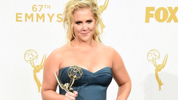 Book on the way . . . Amy Schumer collects her first Emmy.