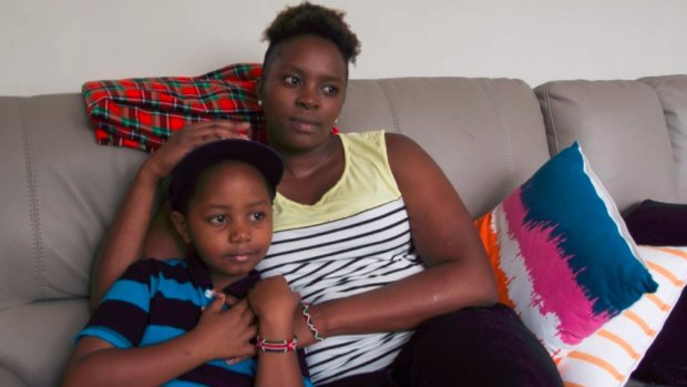 'Shocked': Emy Wamboi and her seven-year-old son Davie Koiya discovered maggots on the chicken they bought at the Nando's restaurant at Westfield Kotara.