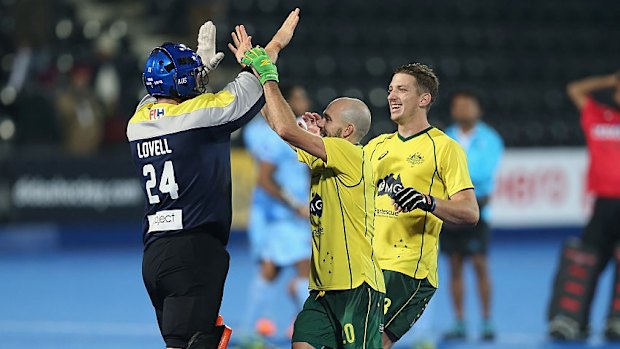 Penalties win: Tyler Lovell of Australia celebrates at the end of the match with team mates Matthew Swan and Simon Orchard.