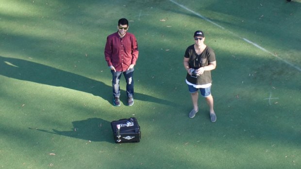 The flight crew at Melbourne's iDrones takes a "dronie."