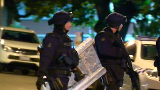 Police in riot gear prepare to enter the Parkville youth centre in November. 