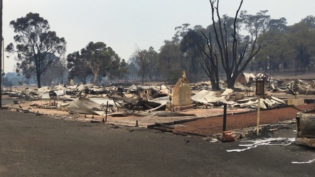 Close to 100 homes were destroyed by the flames.