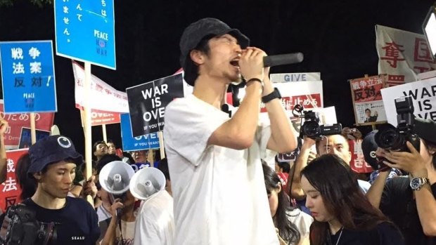 Polite  but determined: Protesters gather in Tokyo to sound off about PM Shinzo Abe's constitutional reforms.