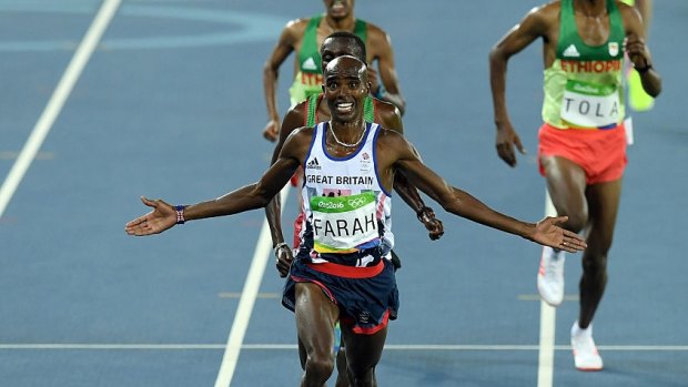 Victor again: Mohamed Farah wins the men's 10,000m.
