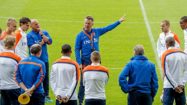 Hard-nosed: Dutch coach Louis van Gaal speaking to his players during a training session in Alkmaar on Tuesday.