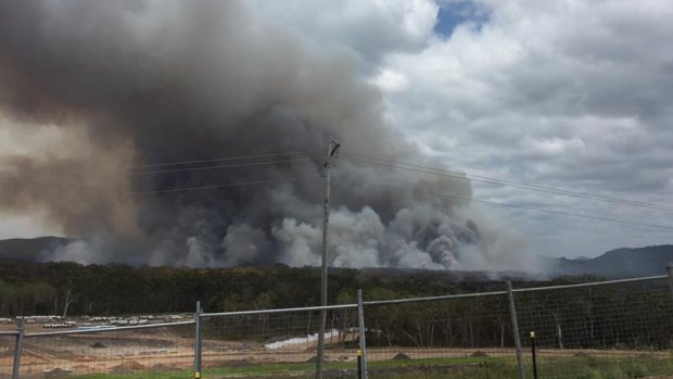 The Coolum bushfire continued to rage on Friday, as seen from the Peregian Springs water tower.