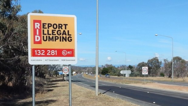 Roadside signs, including this one on the Barton Highway, have been installed to encourage residents to dob in dumpers.