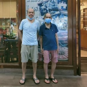 Kelvin, left, and Skinny in front of the restaurant.