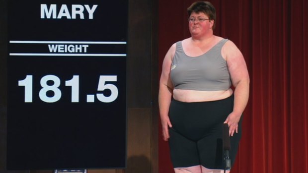 Contestant Mary, from the 2014 season, strips down for her first weigh-in.