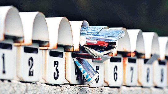 First Use AFR - 09/01/06 - Generic photo of a mail box jammed with unsolicited mail, junkmail, junkmail,postal,australia post,advertising. letterboxes / letterbox
 
Photo by Glenn Campbell