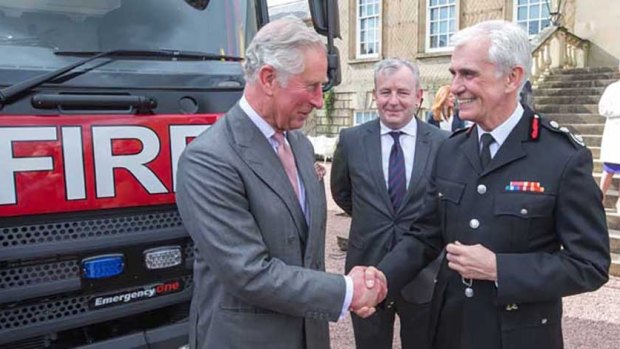 Former London Fire Brigade commissioner Ron Dobson, far right, with Prince Charles.