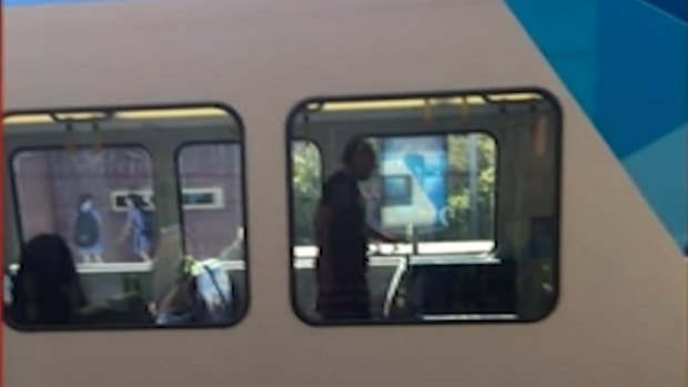 The unprovoked attack forced the city-bound train to stop at Hawthorn station. 