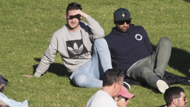 Back home: Former teammates Tim Moltzen and Benji Marshall watch from the hill.