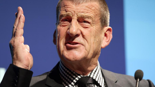 Jeff Kennett has attacked Malcolm Turnbull for engaging in domestic politics while overseas.