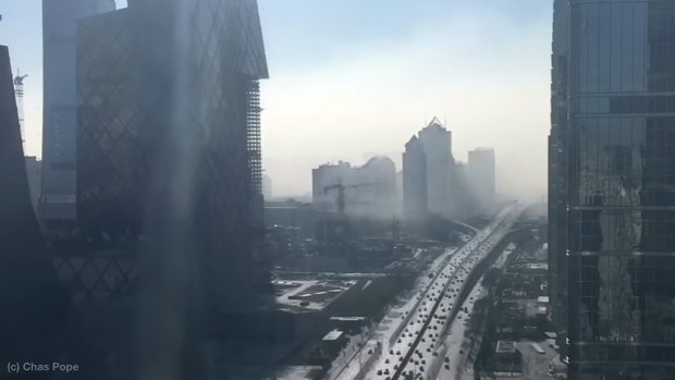 Chas Pope captured a time-lapse video of the smog as it moved in over Beijing. 