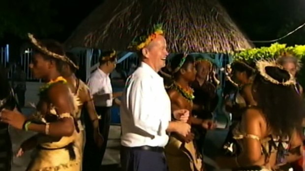 Bill Shorten dances with locals during a trip to Kiribati to raise awareness of climate change.