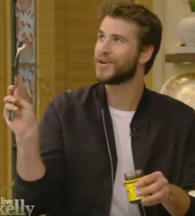 Hemsworth showing "how to Vegemite" last month on US TV.