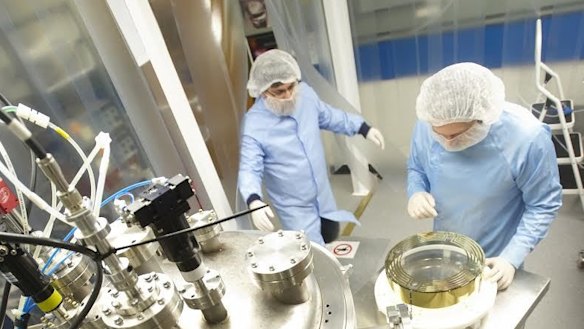 Optical scientists at work in the CSIRO Precision Coating Lab in Lindfield, Sydney.