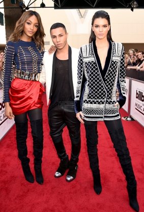 Olivier Rousteing (centre) and model Jourdan Dunn and Kendall Jenner, all wearing Balmain x H&M, at the 2015 Billboard Music Awards in Las Vegas.