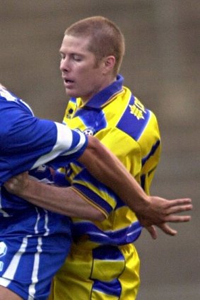 Jeromy Harris (right) playing for the Brisbane Strikers against Sydney Olympic at Suncorp Stadium in 2000.