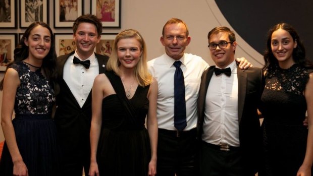 Stephanie Ross (centre) next to former prime minister Tony Abbott.