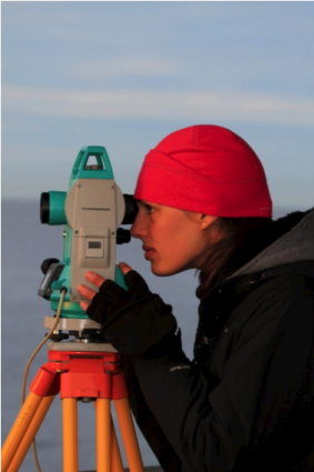 Pirotta tracking whales through a theodolite.