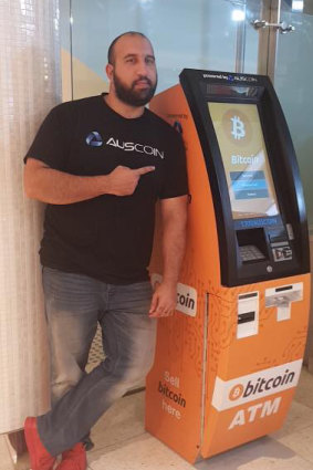 Sam Karagiozis poses with one of his Auscoin ATMs