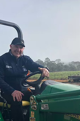 Danny Frawley on a tractor at a friend's stables.