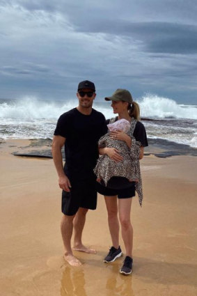 Jen Hawkins with husband Jake and daughter Frankie at Forresters Beach.