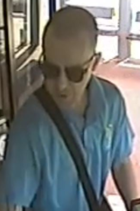 Police have released images of a man after a bus driver was punched in the face at Broadbeach on the Gold Coast. 
