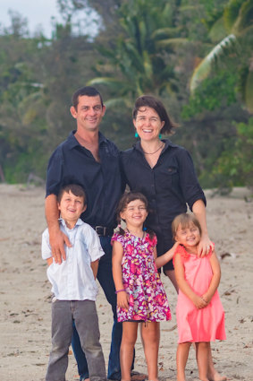 The Willetts family on Port Douglas' Four Mile Beach where they harvest wild-growing coconuts.