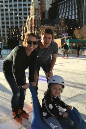 Penny and Nathan Smith from Warner take to the ice rink with daughter Madison, 3.