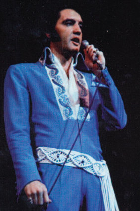 Elvis Presley wears the ivory macrame belt with accented reflective stones that sold in auction.