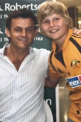 A young Will Pucovski with former Test great Adam Gilchrist