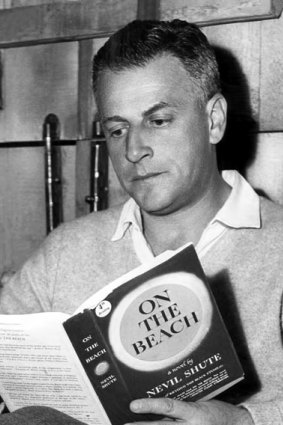 Director Stanley Kramer with a copy of Nevil Shute's novel.