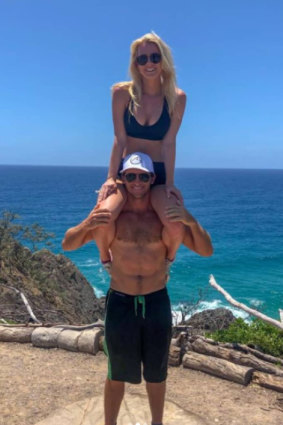 Greg Norman jnr shares a photo from Noosa with partner Michelle Thomson on his shoulders.