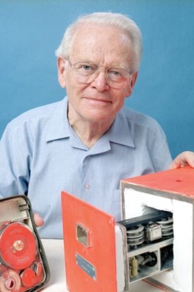 David Warren with an early prototype of the black box flight recorder.